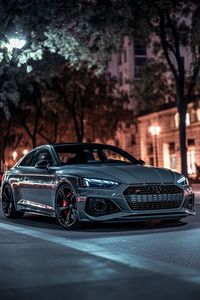 This captivating shot of the Audi RS5 under city lights showcases the perfect blend of power and sophistication. With its sleek design, aggressive stance, and piercing headlights, this beauty owns the night. Whether you're an automotive enthusiast or just love jaw-dropping aesthetics, this image encapsulates what driving an RS5 feels like—bold, refined, and absolutely stunning.