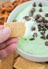 a graham cracker that's been dipped in a mint cheesecake dip #cheese #chocolate #candy #food