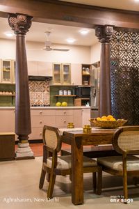 The dining kitchen space from Aghraharam has unique low height dining table that has various health benefits! Taking you back to Aghrahram Streets are the Chettinad pillars uniquely installed with partition in Kitchen entrance. The space surrounds you with the essence of Southern India.