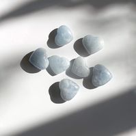 Known for being peaceful and soothing, a Celestite Tumbled Stone can help uplift your energy and calm your mind and spirit. These polished tumbled stones inspire happiness and bring mental calm and clarity. It can also encourage solution-oriented dreams—as in, answers that literally come to you in your sleep. Can’t turn off the to-do lists, future-projecting, and general anxiety when you’re trying to sleep? Keep a cluster of the pastel-blue Celestite Heart Shaped Stones on your bedside table to