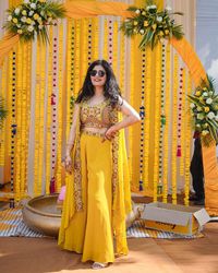 Haldi Rasam Special New Super Trending Embroidery cording work and Party Wear Shrug lahenga              Description  indo-Western Sharara Fabric.     :- Georgette with inner Work        :-Thred with Sequnce Size          :-up to 42(Full-Stitched)  Blouse  Fabric.    :-Benglori silk Work      :-Thred with Sequnce  Size.       :- up to 44 full stiched Shrug  Fabric.   :- Georgette  Work      :-Thred with sequnce COLOR:( As shown in the image, may vary due to lightning, flash light while photo shoot and according to screen settings and resolution ) NOTE : Stitching Service: Stitching available on demand . Once you place the order, We will send you detail of measurements needed for customized stitching No Returns and exchanges on any item