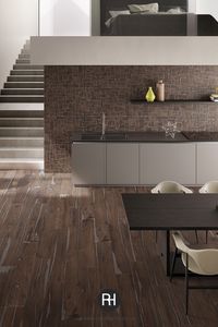 Alter Brucciato is a hardwearing porcelain floor and wall tile that celebrates the beauty of nature. Each tile is made to look like reclaimed oak that has been carefully processed and treated with coloured resin inserts. The result is Alter Brucciato a unique and versatile product that offers a perfect balance of tactile warmth and contemporary style.