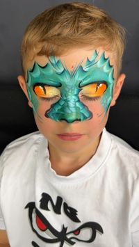 Check out this amazing Dino/Dragon face mask face painting tutorial by very Famous TikTok face painter! @loulabellefacepainting 💕 The cover picture is by @natsfancyfaces This face painting tutorial was inspired by Nat’s picture🦖🐉 Their talent truly shines through in this design, and I couldn’t help but fall in love with it. If you’re looking for some creative inspiration or want to learn a new face painting technique, this tutorial is definitely worth watching. I’m sure you’ll be blown away by their skill and creativity! #facepainting #dinodragon #tutorialreels #facepainters #dinofacepaint #dinofacepainting #dragonfacepaint #dinofacepainting #dinasourparty #dianasourdrawing #dronmask #dinomask #goglamour360 #facepaintingtutorial #facepaintingideas #facepaintingreels #facepaintreels #fac