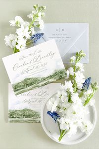 The Cecilia Suite blends a delicate script with structured serif lettering for a romantic and ethereal design. Then, select from an offering of flora-inspired crests and wreaths, along with multiple initial and monogram styles. With its soft artistic aesthetic that plays well with any medium of custom artwork, Cecilia sets the tone for the dreamiest of wedding days.