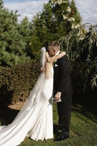 #OurLovelies Lovely Real Bride Kelley said ‘yes’ to Lovers Society ZEPHER from Lovely Bride NYC for her castle nuptials straight out of a fairytale 🏰✨ We can't get over the pure happiness in these photos and the couple's classic black and white scheme with pops of green. Photos by Ruby Olivia Photography. // Find your dream wedding dress at one of our 19 US shops + 1 UK shop! Lovely Bride has the one for you. #modernweddingdress #chicweddingdress #weddinginspiration #castlewedding #nyweddings