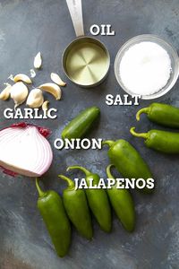 Creamy Jalapeno Sauce - This creamy jalapeno sauce recipe uses no dairy or avocado, yet it is super creamy and wonderfully spicy. It's an emulsification of jalapenos and oil and you'll find it used widely in Tex-Mex cuisine. It is definitely one of my favorites, and incredibly easy to make. #Jalapeno #TexMex #Tex-Mex #Sauce #Spicy #Condiment #ChiliPeppers