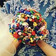 My alternative wedding bouquet I made from board game components, dice, toys and beads. (Yes! I did dye my wedding dress blue!) #gamerwedding #boardgamewedding #boardgamebride #blueweddingdress #alternativebouquet #alternativebride #alternativewedding #geekybride #geekybouquet #offbeatbride #offbeatwedding #geek #boardgamer #tabletopgamer #quirkybride #handmade #boardgamegirl #gamergirl