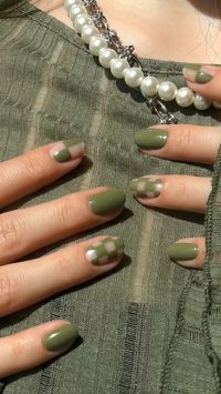 Get ready to rock the season's hottest nail trend with the stunning olive green nail color that's taking the beauty world by storm. This earthy and sophisticated shade adds a touch of elegance and uniqueness to your manicure. Whether you opt for a glossy finish or a trendy matte look, your olive green nails will make a stylish statement. Pair them with any outfit, from casual to formal, and watch heads turn. 💅🌿 #TrendingNailColor #OliveGreenNails #ChicAndOnTrend