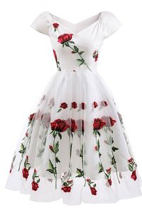 White Off-the-shoulder Rose Embroidered A-line Homecoming Dress. PRODUCT DETAILS SKU: 19M310101. Year: 2019. Shown Color: White. Silhouette: A-line. Sleeve: Off-the-Shoulder. Back Style: Zipper Up. Fabric: Polyester. Neckline: Scoop. Hemline/Train: Tea Length. Embellishment: Embroider. Season: Spring, Summer, Fall, Winter