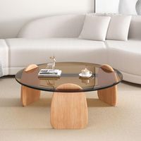 PRICES MAY VARY. Thickened 3cm frame: The round glass coffee table in the living room adopts a circular frame constructed with tooth-jointed tenon technology, which is upgraded and thickened to 3cm to ensure the stability and durability of the frame. The corners are rounded and polished, making it skin-friendly and not stiff. Explosion-proof tempered glass with translucent effect: Glass has high temperature resistance, corrosion resistance, is easy to clean, and is not easy to break. The edges o