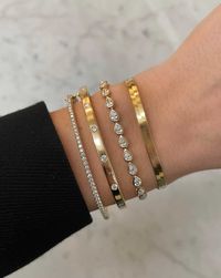 Why We Love It: Bold gold borders pear-cut diamonds in this modern take on the Classic Diamond Tennis Bracelet. We particularly love bezel settings because the gold border helps to enlarge the look of the diamonds set within them. Shop the full Tennis Collection.