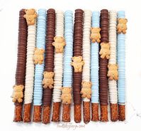 Gourmet chocolate covered pretzel rods as pictured (12 pk) To place your order: Step 1. Choose the Month and date of your event from the drop down menu Step 2.  Provide any modification requests using the " Personalization" option -Helpful Information: *Cold packs/insulation are available to purchase If you are in an area where the temperature is above 80. *All of our items are made fresh, delivered fresh, guaranteed! *Treats are always individually wrapped *In most cases orders will dispatch Mo