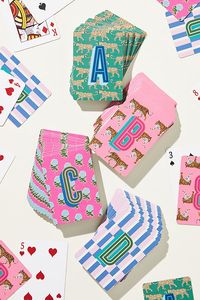 Crafted with exceptional quality, these playing cards offer a smooth feel and durability that ensures countless hours of gameplay. Whether you're hosting a game night with friends or enjoying a quiet evening of solitaire, these monogrammed playing cards add a touch of sophistication to any occasion. | Maya Monogrammed Playing Cards by Clairebella in Pink, Size: Mono s, Acrylic at Anthropologie