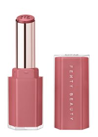 Product Details Get luscious shine with Fenty Beauty's glossy, medium pigment lipstick that's loaded with Vitamin E and Shea Butter, plus Squalane to lock in moisture for up to 8 hours.; It's about to get juicy: luscious lip gloss and lipstick hooked up, and now you can get Gloss Bomb's explosive shine in a colour-packed stick. The moisture-lock formula is packed with lip-loving ingredients to condition, nourish and keep lips looking plump.; How To Use For a sheer wash of colour, use a tapping m