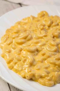 Creamy Stovetop Mac and Cheese is an easy and delicious homemade macaroni and cheese recipe made with cheddar cheese soup, heavy cream, mozzarella and cheddar cheese.