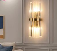 Crystal Wall Light Gold Creative Design Details: is_ customized: NO Warranty: 2 years Wall lamp item type: LED wall lamps Wall lamp Voltage: AC110-240V Wall lamp Size: W20 H49cm Wall lamp Place: Bedside, Bedroom, Hallway Wall lamp Material: Stainless steel, Crystal Wall lamp Light Base: E14 LED Bulbs Wall lamp Color: Gold Voltage: 90-260V Usage: HOLIDAY Technics: Plated Switch Type: Touch On/Off Switch Style: Modern Style Shade Type: CRYSTAL Shade Direction: Up & Down Power Source: AC Number of