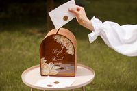 Perfect for Our wooden wedding chest for envelopes is a unique accessory that will not only store your valuable gifts, but also become a charming detail of your wedding decor. It will perfectly fit into your rustic, classic or boho wedding style. Made of high-quality wood and hand-finished, each chest is as unique and unique as your love story. Its natural texture and exquisite design harmoniously fit into the atmosphere of the wedding celebration, creating a relaxed aura of warmth and coziness.