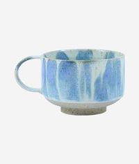 The Mion Mug is a hand thrown stoneware mug (with handle) available in various textured, earthy and colorful glazes. A departure from the original Chug Mug, the Mion offers a rustic charm all its own, and holds more of the good stuff. *Please note: Each hand made Studio Arhoj piece is a unique version of what is represented in the photos shown here. We cannot accommodate requests for photos of specific colors. Color will be chosen at random. Details: 15.2 oz 3"H x 5.5"W Dishwasher safe, but hand