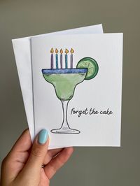 "This card is perfect for those who would choose a margarita over a birthday cake! Celebrate your loved one with this fun and witty birthday card. - A2 sized greeting card (pictured) measuring 4.25\" x 5.5\" when folded. - Greeting card is made with high quality premium card stock. - The interior of the card is blank, leaving room for you to write a custom and heartfelt message. - All cards are sent with a blank white envelope. Return Policy - Unfortunately, we do not accept returns. However, please message me if you have issues with your order."