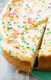 This creamy vanilla cheesecake is bursting with rainbow sprinkles and is baked atop my favorite graham cracker crust. Perfect for any day requiring celebration! Recipe on sallysbakingaddiction.com