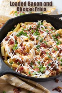 Great for a side dish or appetizer, these Loaded Bacon and Cheese Fries are full of bacon, sour cream, and cheesy goodness! Perfect for game day!