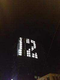 Number 12 in lit windows on a skyscraper #Numbers