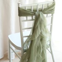 Explore our Dusty Sage Green Chiffon Hoods with Willow Chair Sashes set. Perfect for adding elegance to your event decor. ✓ Get yours now!