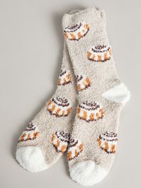 These Cinnamon Roll Cozy Socks are a must-have for this season. With its soft fabric and stretchy material, these socks will have you feeling comfortable all day long. Whether you are lounging around your house or looking for a great gift idea, these socks are the perfect option.