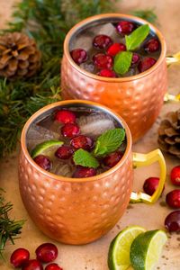 This cranberry Moscow mule recipe is made with vodka, cranberry juice, lime juice and ginger beer, all mixed together to create a refreshing and festive cocktail.