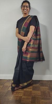 The first saree I fell in love with and asked my mum to buy :D Pure silk and is a bit stiff. Contrasting pallu.