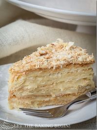 Russian Napoleon Cake is the ultimate Napoleon Cake and a cousin of the traditional Napoleon Recipe, it is made of crispy layers of puff pastry, sandwiched together with creamy and buttery custard.