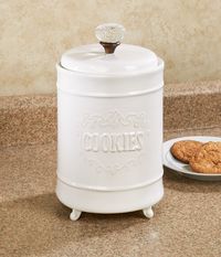 The Circa White Cookie Jar brings old-fashioned elegance to your kitchen with its milk-glazed ceramic and beautiful embossed scrolls.