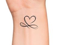 Infinity Heart Temporary Tattoo Size: The size of this temporary tattoo is approximately 1 1/2 inches Directions: 1. Cut excess paper around tattoo with scissors to eliminate any unnecessary adhesive on your skin after applying. 2. Peel away the clear plastic layer. 3. Apply the tattoo image side to your skin and cover with a damp cloth for 20 seconds. 4. Carefully peel back paper off of your skin and allow the tattoo to dry for at least 10 seconds. Do not touch it. 5. After allowing for dry tim