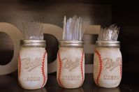 Decorated mason jars at a vintage Mickey baseball birthday party! See more party planning ideas at CatchMyParty.com!