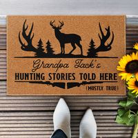 Transform your home entrance into a haven for hunting enthusiasts with our personalized doormat. This unique home decoration gift is specially crafted for grandpa, dad, and the entire family who share a passion for hunting. The doormat features a charming design that proudly declares, "Hunting Stories Told Here," creating a warm and inviting atmosphere for all who enter. The personalized touch adds a sense of identity, making it a thoughtful and cherished addition to any home. Welcome guests and family members alike with this one-of-a-kind doormat that celebrates the love for hunting and the stories that come with it.MESSAGE:  Hunting Stories Told Here (Mostly True). PRODUCT DETAILS:    Each doormat is made from luxurious plush velour and features a premium heat dye sublimation print for l