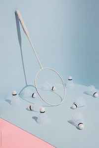 badminton rackets on pink and blue background by Audrey Shtecinjo  - Badminton, Game - Stocksy United