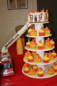 Fireman Burning House Cake With Flame Cupcakes For Grooms Party  on Cake Central