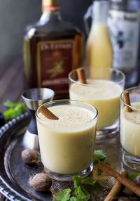 This dairy-free Holiday Spiked Eggnog is made with amaretto and white rum. It's a creamy and delicious cocktail that's perfect for the holiday season!  #eggnog #holidaydrink #cocktail #spikedeggnog #spikedeggnogrecipe #eggnogwithalcohol #holidaycocktail #easycocktail #easycocktailrecipe