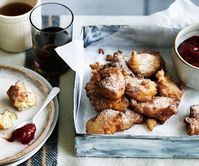 Rice pudding fritters with rhubarb and winter strawberry jam recipe | Gourmet Traveller