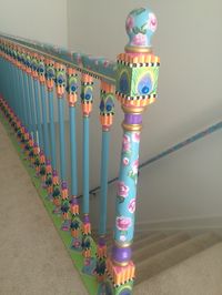 Peacock painted and beaded stair railing