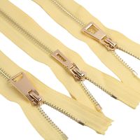 "Gold Teeth Brass Metal Zipper | Yellow Color | 1pack of 5pcs | 6 inch-40 inch Size & 8 Color Option | Bag Zipper, Purse Zipper, Fashion Zipper, Bag Making Quantity: 5 Pcs (Selecting \"1\" means you will get 5 pcs of Zippers) Upgrade your sewing and crafting projects high-quality colored zippers in elegant yellow tones. Whether you're a seasoned seamstress or just starting out, these zippers are perfect for adding a touch of sophistication and functionality to your creations. Each zipper in this