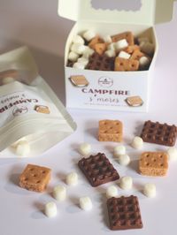 Introducing our delightful S'mores Wax Melts, designed to bring the irresistible aroma of everyone's favorite campfire treat into your home. These wax melts are creatively shaped like miniature marshmallows, chocolate squares, and graham crackers. The iconic components of the classic s'mores recipe. Each melt is handcrafted with a blend of high quality scented wax that captures the essence of toasted marshmallows, milk chocolate, and warm, graham crackers. As you warm these melts, your space wil