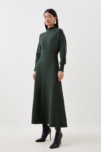 Compact Knit Wool Look Full Skirt Midaxi Dress - Green - Remain elegant and cosy in this knit dress, crafted from sumptuous wool knit for a delicate touch. A funnel neck and cuffed sleeves add classic detailing, while a full skirt flares to a midaxi length, making this the idyllic dress choice for cooler days. Pair this piece with heeled boots for a sophisticated ensemble that can be worn from day to night.Long SleevesWoolFull skirtFunnel neck