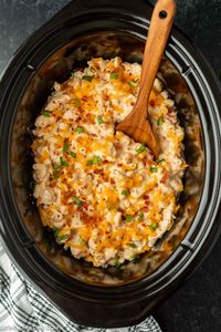 Crock Pot Chicken Casserole Recipe is creamy and delicious. It is loaded with cream cheese, bacon and ranch flavor that your family will go crazy for!