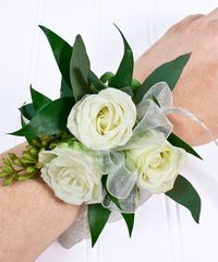 Perfect for a petite wrist, this small corsage of white spray roses can be elegantly customized with your choice of ribbon color.  spray roses, white, rose, wristlet, corsage, greenery, ruscus, seeded eucalyptus