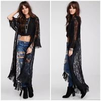 Bohemian Chic Black Lace Sheer Maxi Duster With Long Tassel Fringe Along Bottom Hem And Sleeves. This Is Such A Versatile Piece As It Would Make A Great Swim Coverup And Can Be Worn Layered Over Your Daytime Outfit Or Dressed Up For A Sexy Evening Piece!