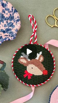 Coco Frank Studio on Instagram: "Finishing our Reindeer canvas into an extra puffy needlepoint ornament! I used a different method for affixing the needlepoint to the mat board and I thought it turned out nicely. And how beautiful is @kels.stitches.ndlpt ‘s stitching?! She really made it her own with decorative stitches, fun fibers, and color swapping - details are listed on the blog ♥️"