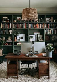 From Billy Bookcases to this "built in" office unit. Green office. Boho chic office. Front room green office built ins. Wood ans green tone office. IKEA Billy book case built ins. Realistic and cheap built ins. Pristine Wilderness by Shermin Williams