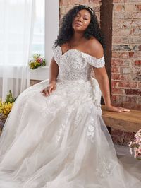 Lace off the shoulder a-line bridal gown with sparkle tulle. Available off the rack at Silk Bridal Studio. 5'6" hem.