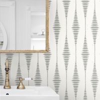 Diamond shapes are created with horizontal lines and joined in vertical stripes. Beaded for glamorous texture and a subtle light reflecting sparkle. Shown here in the white colourway. Actual pattern repeat is 16cm.